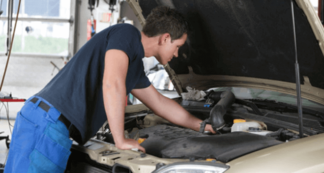 Mechanic working on a car